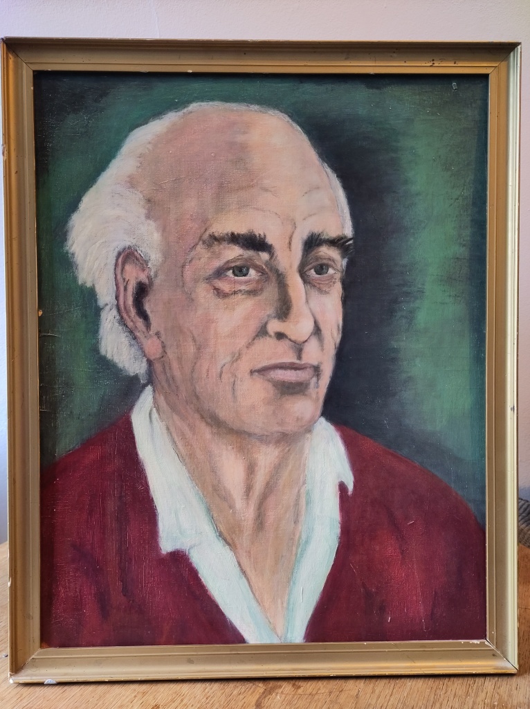 Oil portrait of an elderly white man's head and shoulders, on a green background. He has a bald pate surrounded by white hair, dark bushy eyebrows, and is wearing a red V-neck jumper and white shirt. 