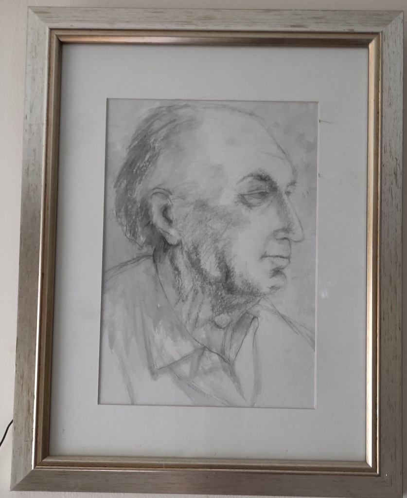 Framed pencil sketch of an elderly white man's head and shoulders.