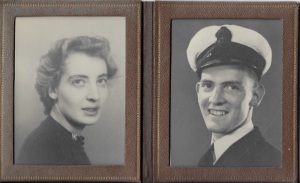Two 1940s black and white studio photographs in a brown frame. The left is a glamorous white woman with curly brown hair. The right is a young man in a British navy uniform and cap, with prominent ears. Both are smiling.
